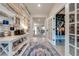 Stylish entryway with French doors opening to the living room at 2867 Matera Dr, St Cloud, FL 34771