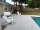 Spacious pool area with patio furniture for relaxation at 705 Vandergrift Dr, Ocoee, FL 34761