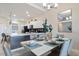 Bright dining area with modern table and chairs at 3171 Paradox Cir # 403, Kissimmee, FL 34746
