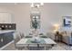 Modern dining room with view of kitchen at 3171 Paradox Cir # 403, Kissimmee, FL 34746