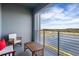 Relaxing balcony with lake views and outdoor furniture at 3171 Paradox Cir # 403, Kissimmee, FL 34746