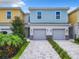 Two-story townhome with attached garage at 7912 Draw St, Reunion, FL 34747