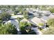 Aerial view of neighborhood, showcasing homes and landscape at 3075 Barbados Ln, Haines City, FL 33844