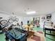 Finished garage, game tables, and storage space at 3075 Barbados Ln, Haines City, FL 33844