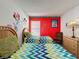 Fun bedroom with twin beds and Mickey Mouse decor at 3075 Barbados Ln, Haines City, FL 33844