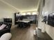 Open kitchen with large island and stainless steel appliances at 8079 Nemours Pkwy, Orlando, FL 32827