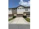 Front view of townhome building at 8079 Nemours Pkwy, Orlando, FL 32827
