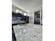 Elegant kitchen with granite countertops and ample cabinet space at 8079 Nemours Pkwy, Orlando, FL 32827