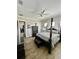 Spacious bedroom with king-size bed and en-suite bathroom at 8079 Nemours Pkwy, Orlando, FL 32827