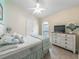 Bright bedroom with a comfortable bed and plenty of closet space at 7978 Magnolia Bend Ct, Kissimmee, FL 34747