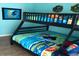 Fun ' bedroom with a bunk bed and nautical theme at 7978 Magnolia Bend Ct, Kissimmee, FL 34747