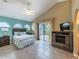 Spacious Primary bedroom with sliding doors to backyard at 7978 Magnolia Bend Ct, Kissimmee, FL 34747