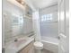 Clean bathroom with tub, shower, and updated vanity at 7978 Magnolia Bend Ct, Kissimmee, FL 34747