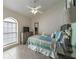 Guest bedroom with comfortable bed and plenty of natural light at 7978 Magnolia Bend Ct, Kissimmee, FL 34747