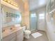 Clean bathroom with shower, toilet, and updated vanity at 7978 Magnolia Bend Ct, Kissimmee, FL 34747
