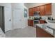 Modern kitchen with stainless steel appliances and granite countertops at 7978 Magnolia Bend Ct, Kissimmee, FL 34747
