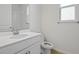 Clean bathroom with white vanity and tile floor at 2043 Stetson Ct, Eagle Lake, FL 33839