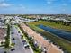 Aerial view of townhouses and community at 8971 Stinger Dr, Davenport, FL 33896