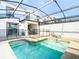 Private screened pool and spa with safety fence at 8971 Stinger Dr, Davenport, FL 33896
