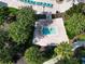 An elevated hot tub nestled in lush landscaping, offering a relaxing retreat at 8971 Stinger Dr, Davenport, FL 33896