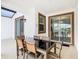 Covered patio with table and chairs, adjacent to the house at 8971 Stinger Dr, Davenport, FL 33896