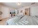 Main bedroom with comfortable bed and dresser at 2662 Trafalgar Blvd, Kissimmee, FL 34758