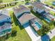 Two-story house with a pool and lush landscaping at 2662 Trafalgar Blvd, Kissimmee, FL 34758