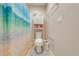 Clean bathroom with toilet, shower, and vanity at 2662 Trafalgar Blvd, Kissimmee, FL 34758