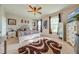 Main bedroom with a king-size bed and a large walk-in closet at 2662 Trafalgar Blvd, Kissimmee, FL 34758