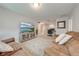 Spacious bonus room with comfortable seating and a large TV at 2662 Trafalgar Blvd, Kissimmee, FL 34758