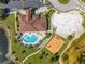 Community clubhouse with pool and playground visible from above at 2662 Trafalgar Blvd, Kissimmee, FL 34758