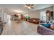 Spacious living area features leather sofas and a large flat screen TV at 2662 Trafalgar Blvd, Kissimmee, FL 34758