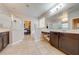 Primary bathroom with double vanity, shower, and garden tub at 2662 Trafalgar Blvd, Kissimmee, FL 34758