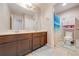 Double vanity bathroom with shower and toilet at 2662 Trafalgar Blvd, Kissimmee, FL 34758