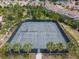 Aerial view of two tennis courts in a residential community at 1735 Oak Blossom Dr, Davenport, FL 33837