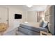 Bedroom with a king-size bed and TV at 8963 Amelia Downs Trl, Kissimmee, FL 34747