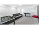 Game room with foosball, air hockey, and seating at 8963 Amelia Downs Trl, Kissimmee, FL 34747