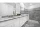 Double vanity bathroom with walk in shower at 8963 Amelia Downs Trl, Kissimmee, FL 34747