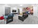 Fun game room, featuring Mario mural and games at 8963 Amelia Downs Trl, Kissimmee, FL 34747