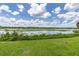 Picturesque lakefront property with lush greenery at 1130 N Lake Parker Ave # C129, Lakeland, FL 33805