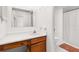 Clean bathroom with wood vanity and shower/tub combo at 1130 N Lake Parker Ave # C129, Lakeland, FL 33805