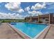 Refreshing community pool with lake views, perfect for relaxing at 1130 N Lake Parker Ave # C129, Lakeland, FL 33805
