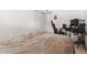 Cozy bedroom with a bed, computer and gaming chair at 1130 N Lake Parker Ave # C129, Lakeland, FL 33805