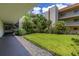 Pathway alongside a grassy courtyard area at 1130 N Lake Parker Ave # C129, Lakeland, FL 33805