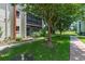 Exterior view showing building and landscaped grounds at 1130 N Lake Parker Ave # C129, Lakeland, FL 33805
