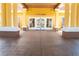 Inviting clubhouse entrance with columns and double doors at 3006 Red Ginger Rd, Kissimmee, FL 34747