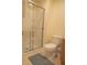 Clean bathroom with a shower and toilet at 3006 Red Ginger Rd, Kissimmee, FL 34747