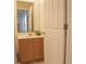 Vanity with a mirror and a toilet at 3006 Red Ginger Rd, Kissimmee, FL 34747