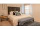 Spacious bedroom with a king-size bed and stylish decor at 3006 Red Ginger Rd, Kissimmee, FL 34747