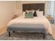 King-size bed, plush pillows, and a modern aesthetic at 3006 Red Ginger Rd, Kissimmee, FL 34747